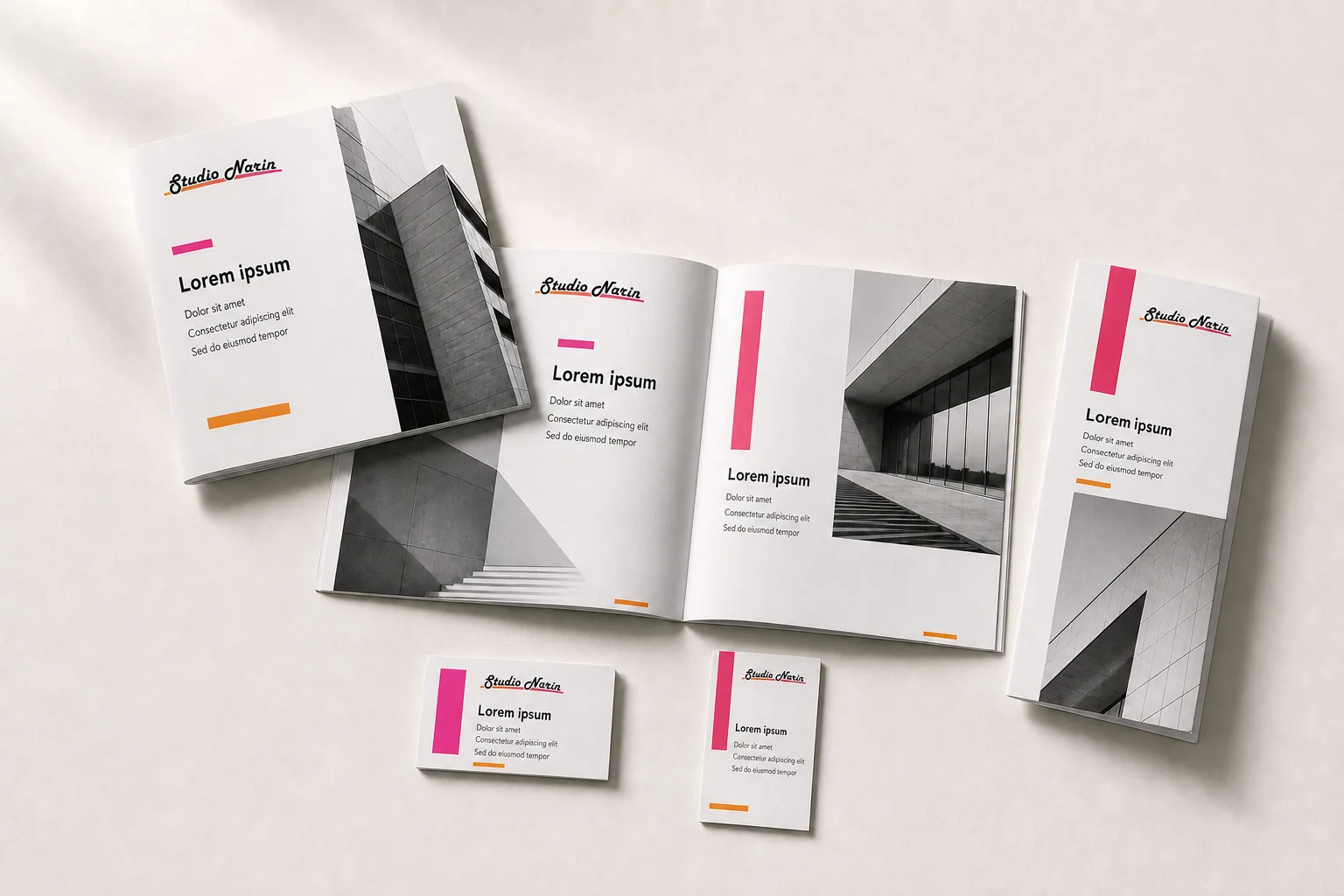 Samenhangend Studio Narin-drukwerk met brochures, flyers en kaarten in roze, oranje, zwart en wit.